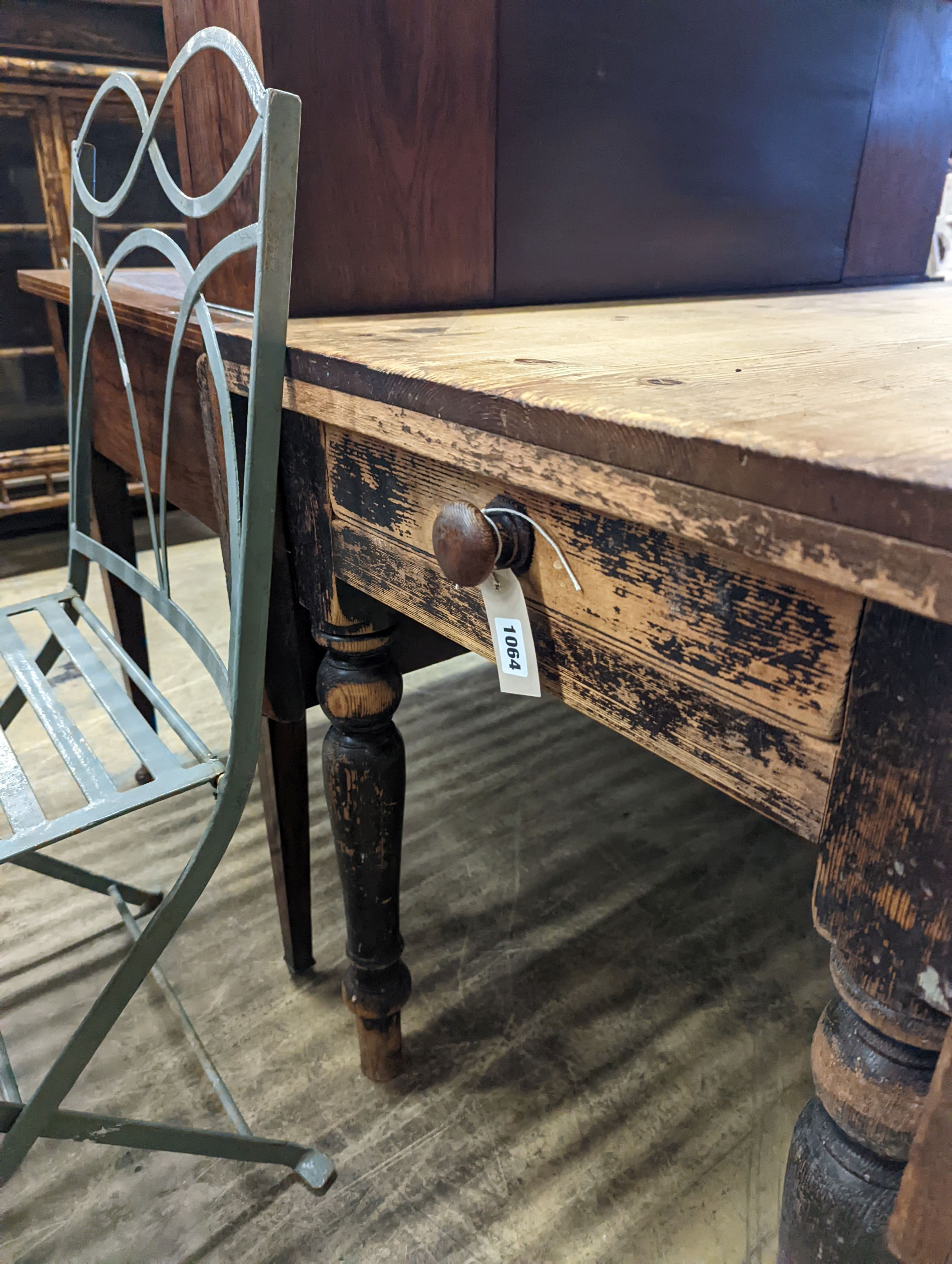 A Victorian pine drop flap kitchen table fitted drawer, width 122cm, length 117cm extended, height 70cm